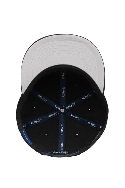 Bottom view of the FC Porto Dusk Snapback Hat in Black with high crown and flat peak.
